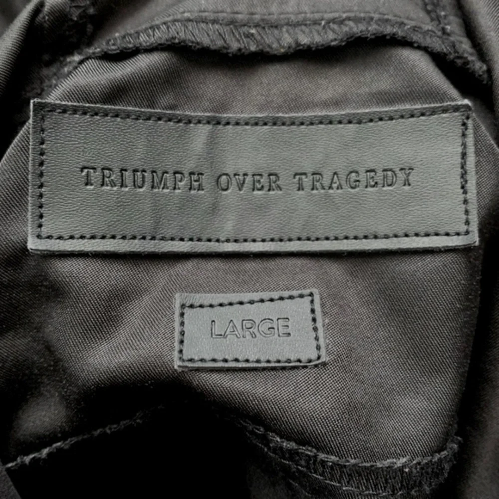 Triumph Over Tragedy Lightweight Black Pete Jacket